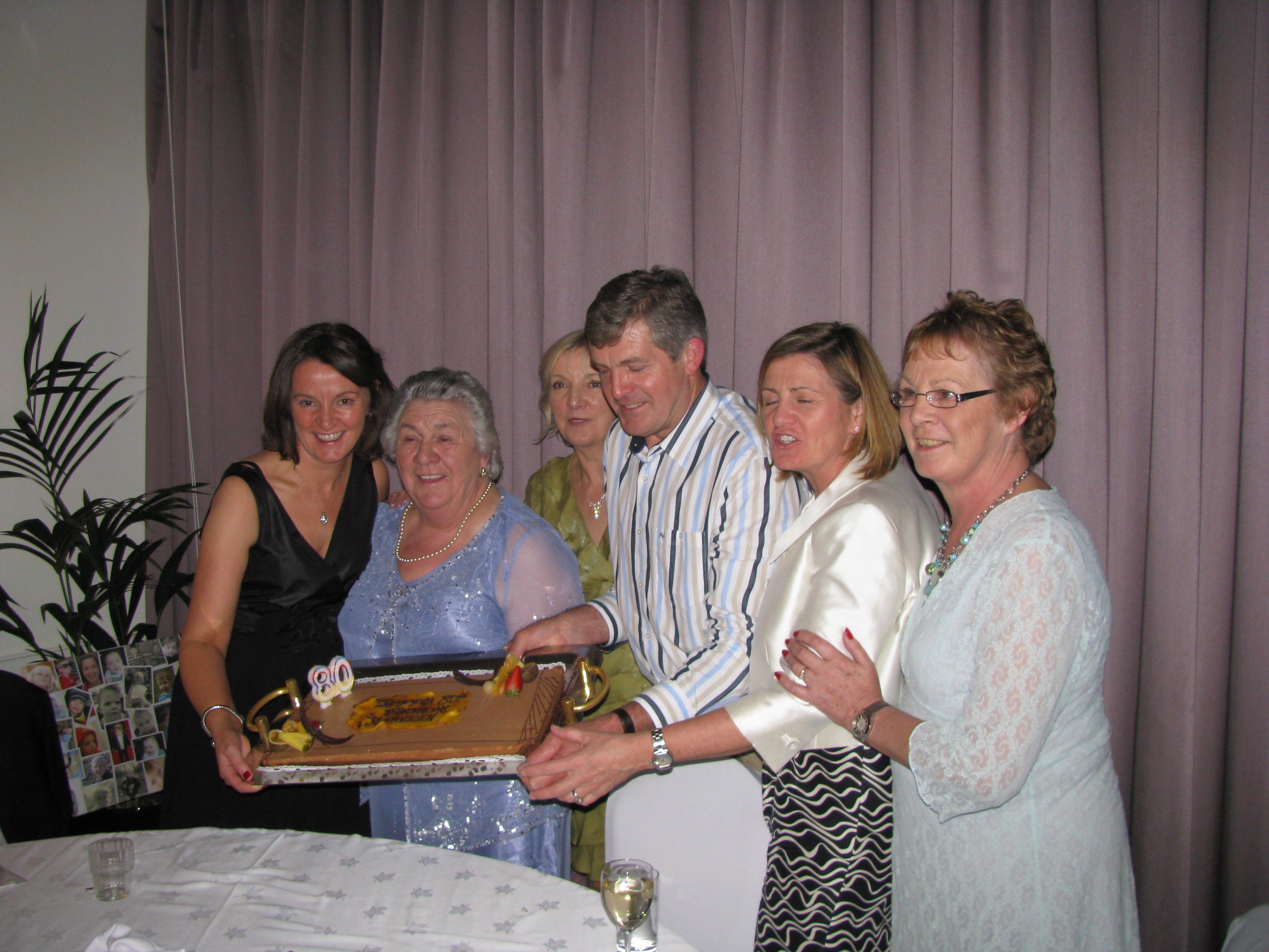 the whole family and the cake